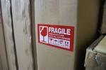 warehouse fragile sign